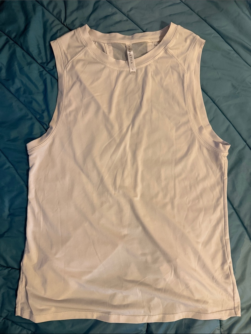 Fabletics and Athleta workout tops